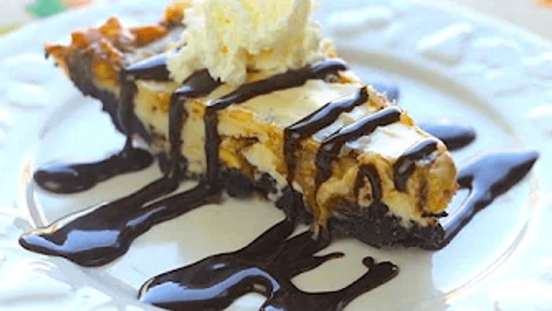 How To Make OREO Snickers Cheesecake | Simply Bakings thumbnail